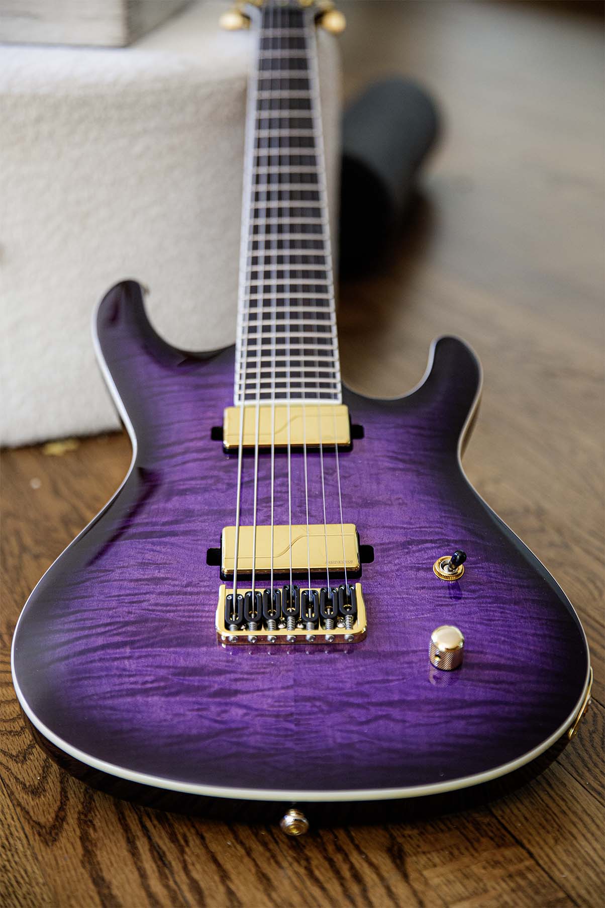 Elite 7 Fluence Gold — Purple Burst hero